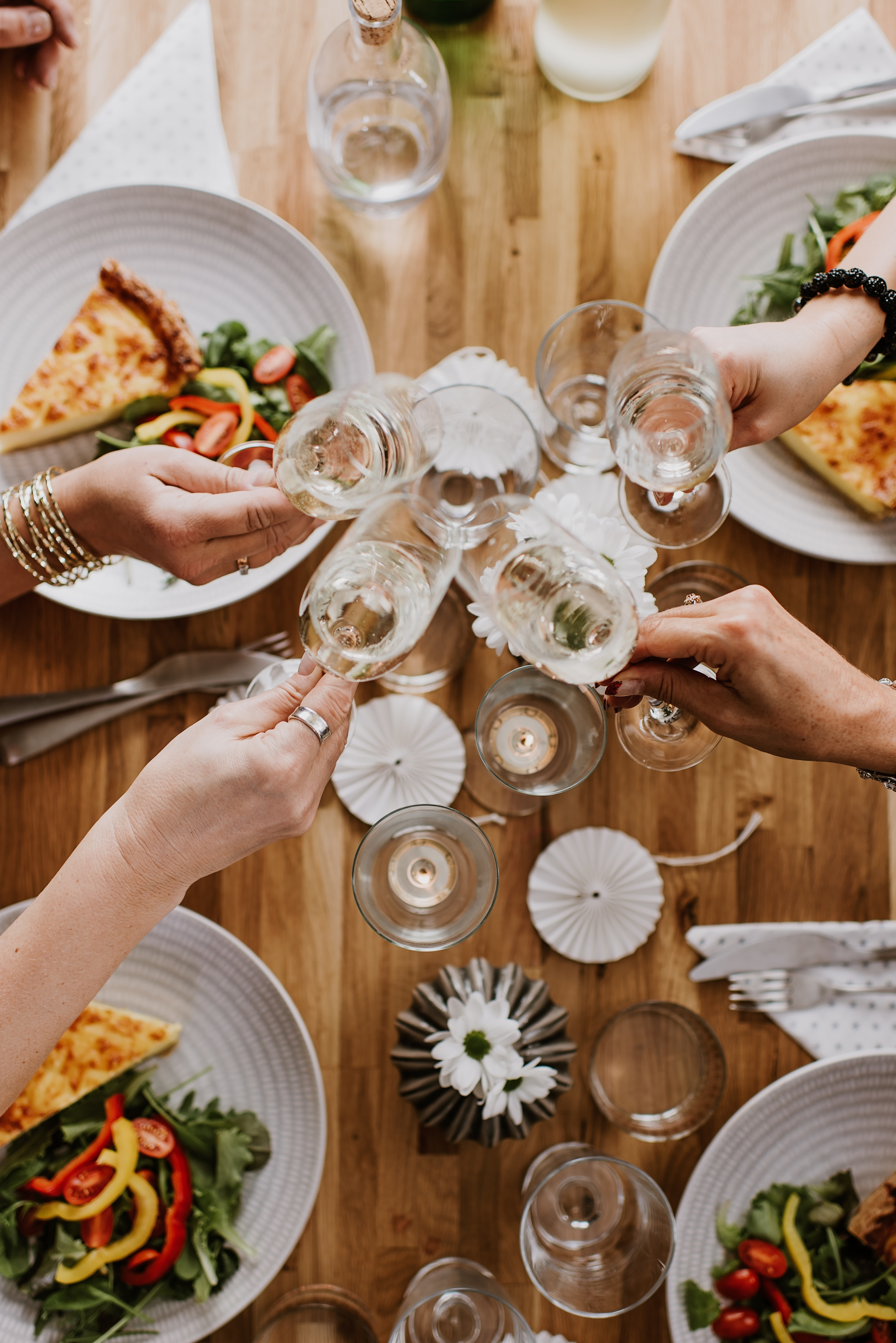 Mature women having dinner party